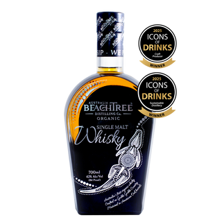 BeachTree Single Malt Whisky bottle with awards on a white background